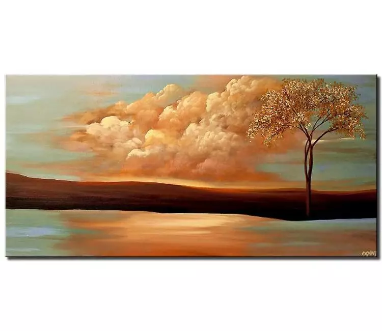 print on canvas - canvas print of single tree on river bank with background of clouds