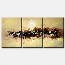 three abstract canvases in brown and sandy colors