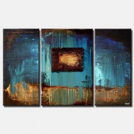 textured abstract painting in blue triptych