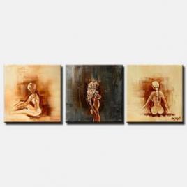 naked woman painting on triptych canvas